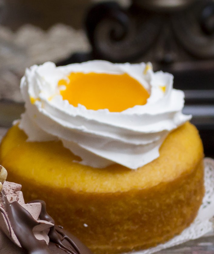 A lilikoi-flavored cupcake topped with lilikoi flavored glaze.